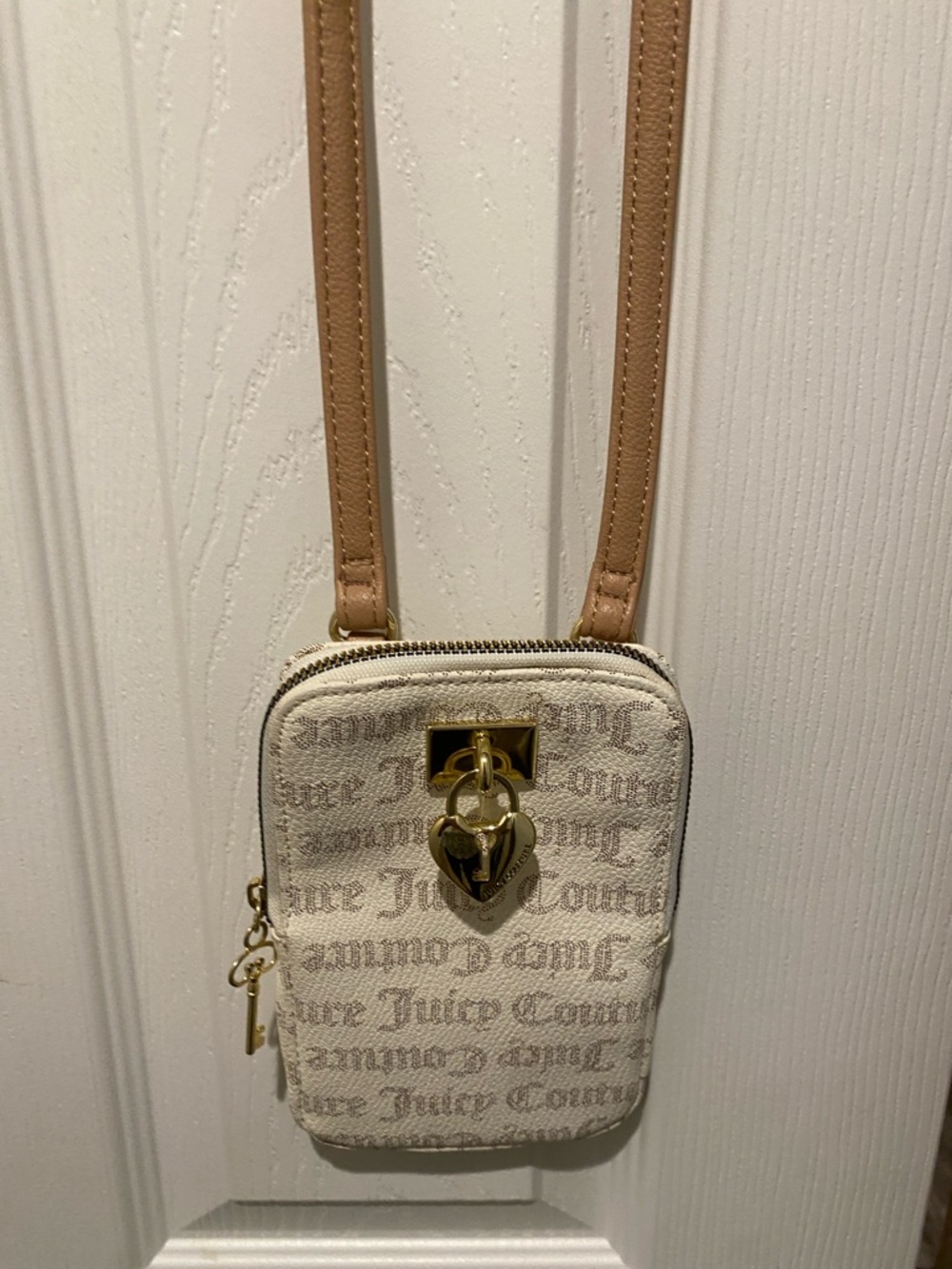 Juicy Couture Cream Crossbody Phone Pouch with Tan Strap and Gold Heart Lock